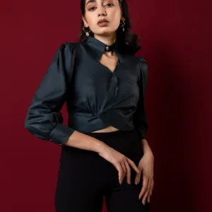 Woman in dark green top and black pants